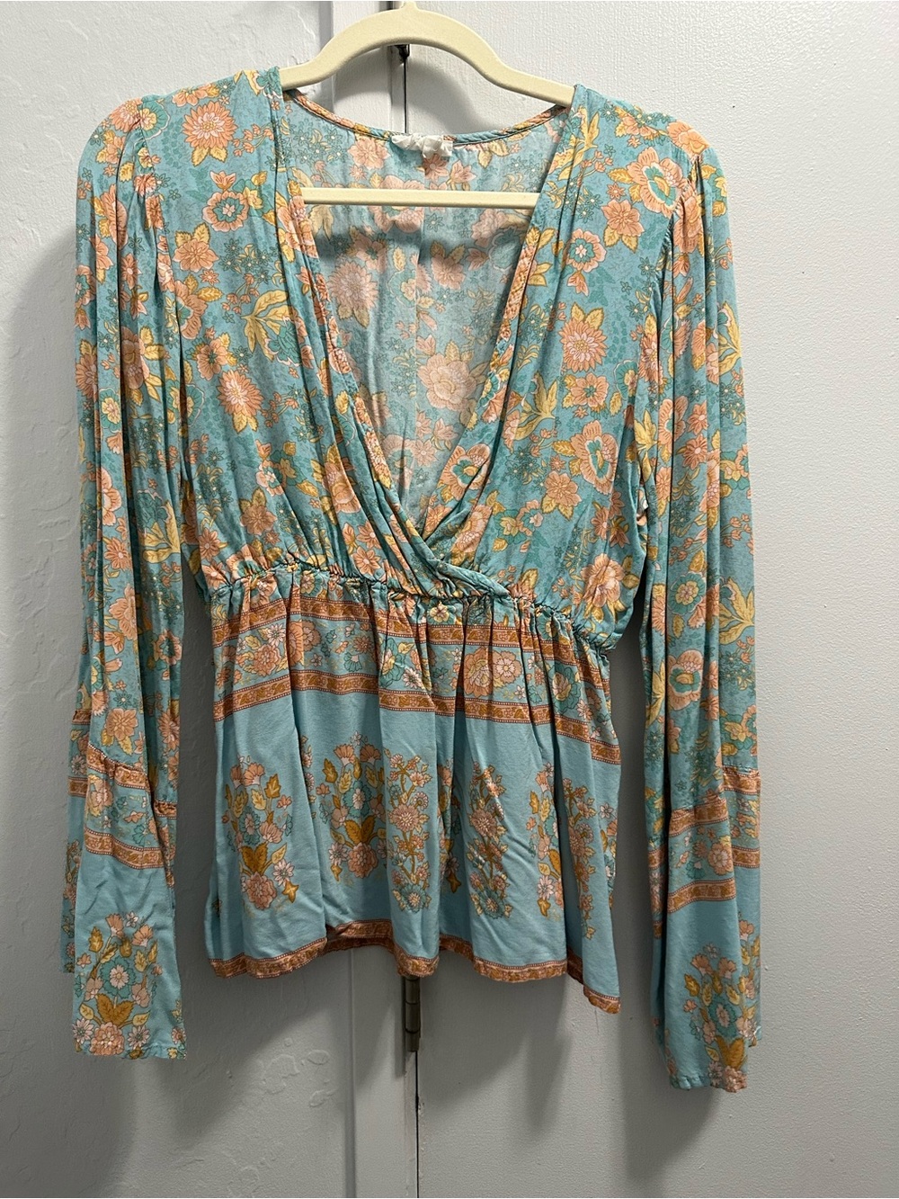 Floral V-Neck Peplum Blouse in Light Blue